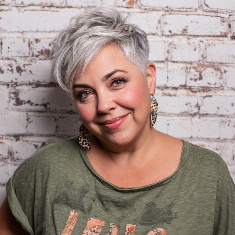 Trendy Silver Pixie Cut with Playful Texture