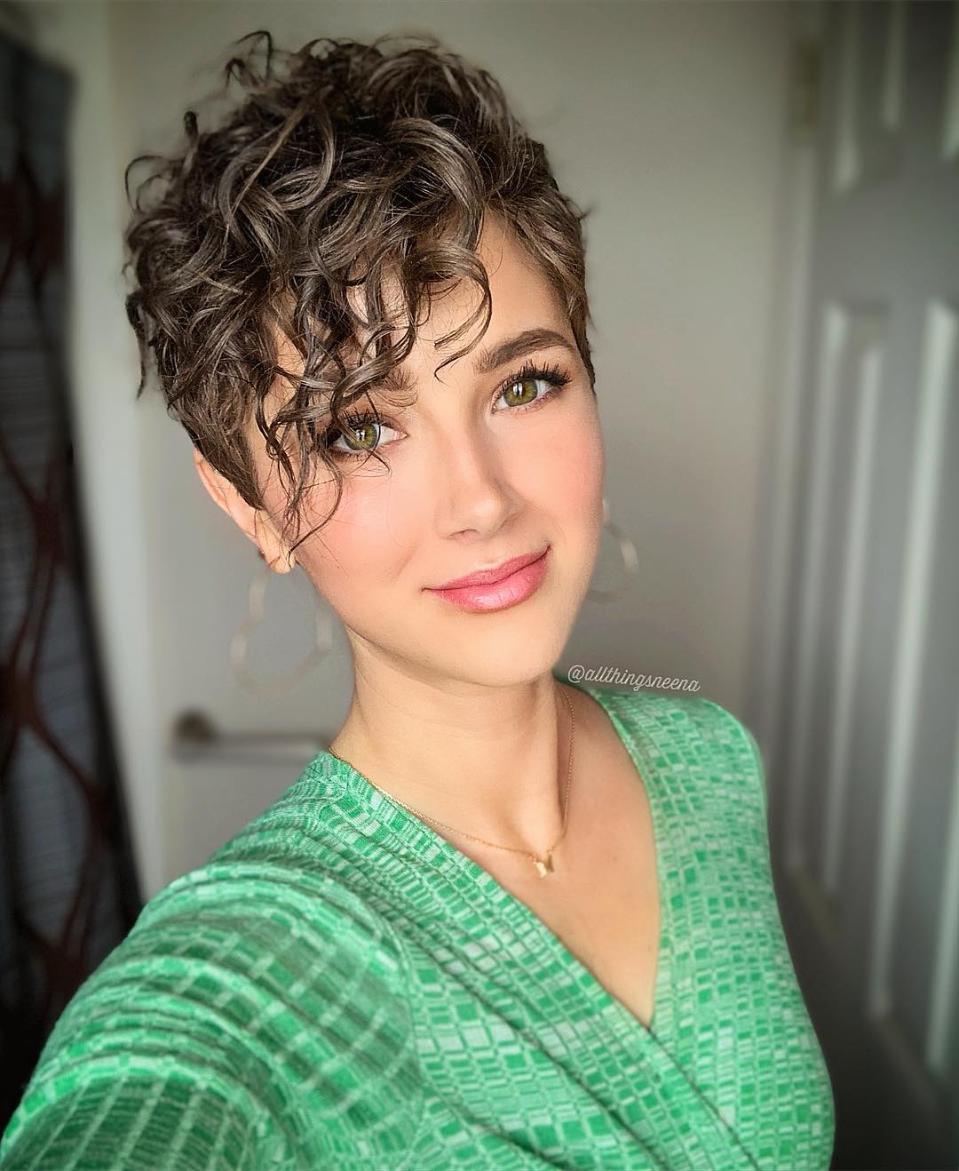 Stylish Short Wavy Pixie Cut with Defined Curls