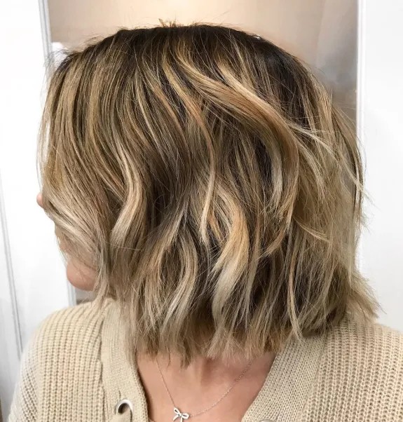 Chic Textured Choppy Bob with Sunlit Highlights