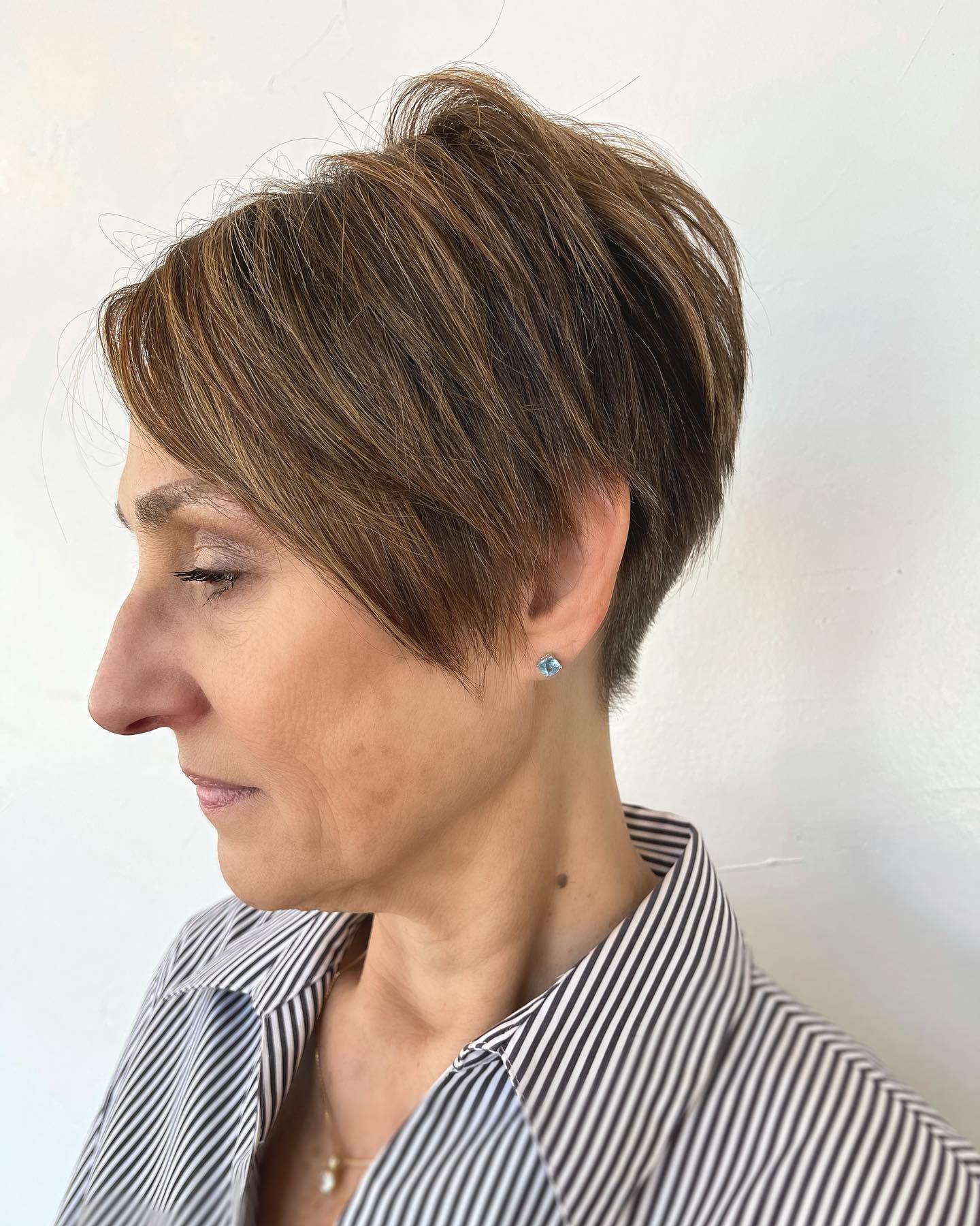 Chic Textured Short Cut with Subtle Highlights