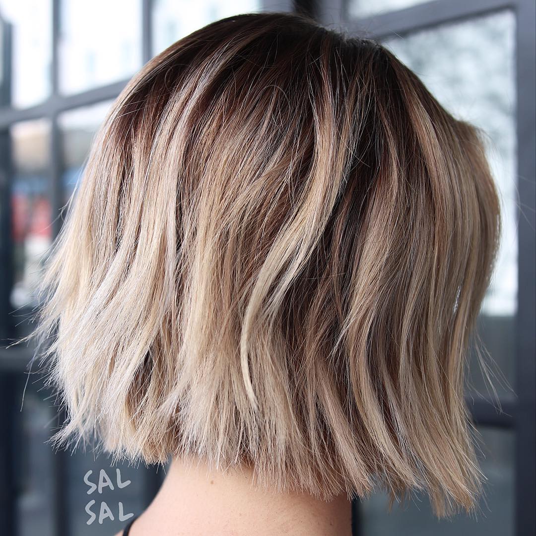Modern Textured Choppy Bob with Light Caramel Highlights