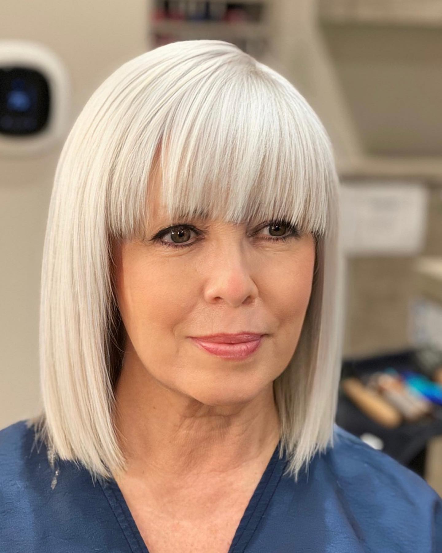 Sleek Blunt Bob with Bold Bangs