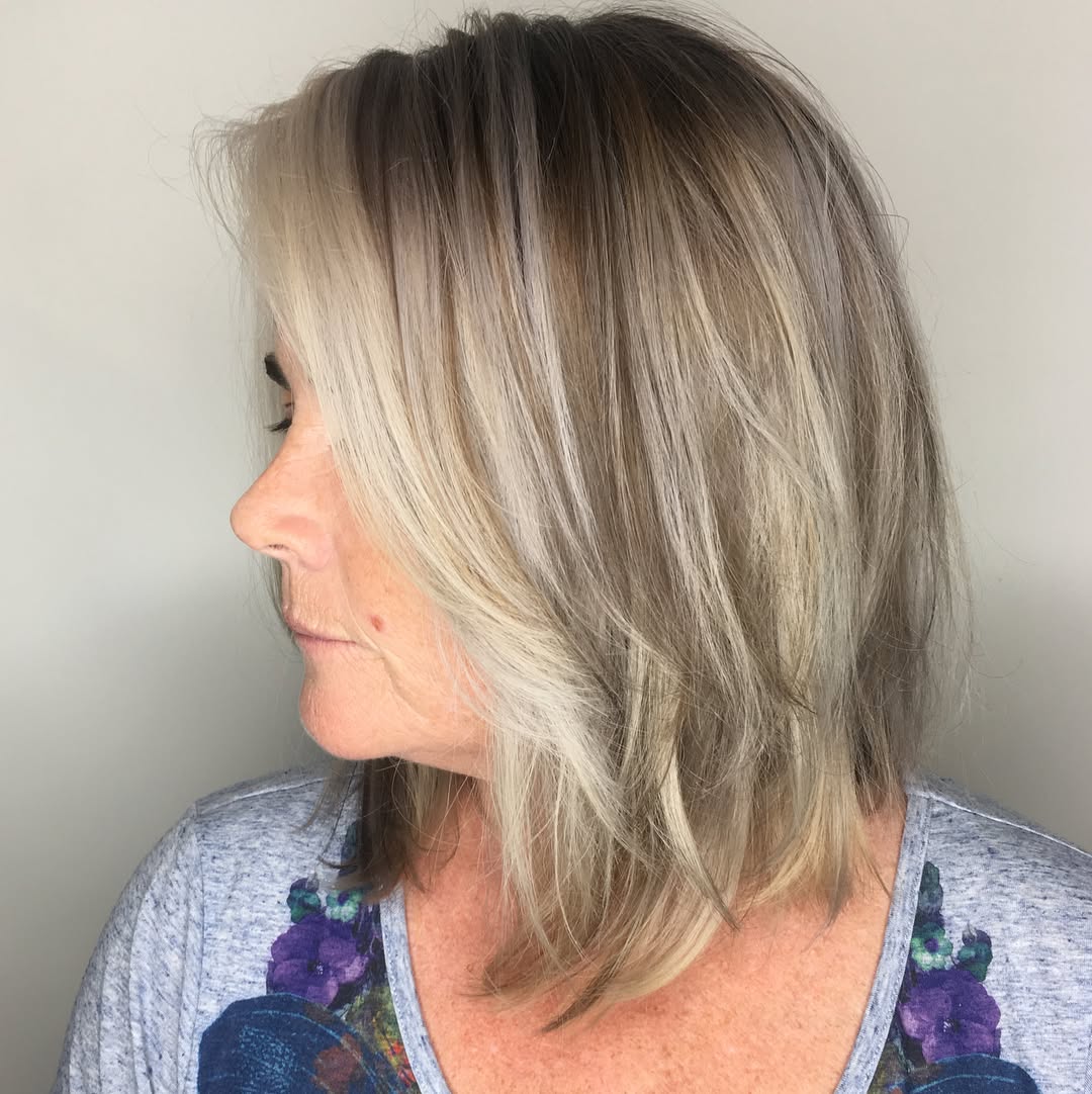 Softly Layered Ash Blonde Cut with Subtle Silver Undertones