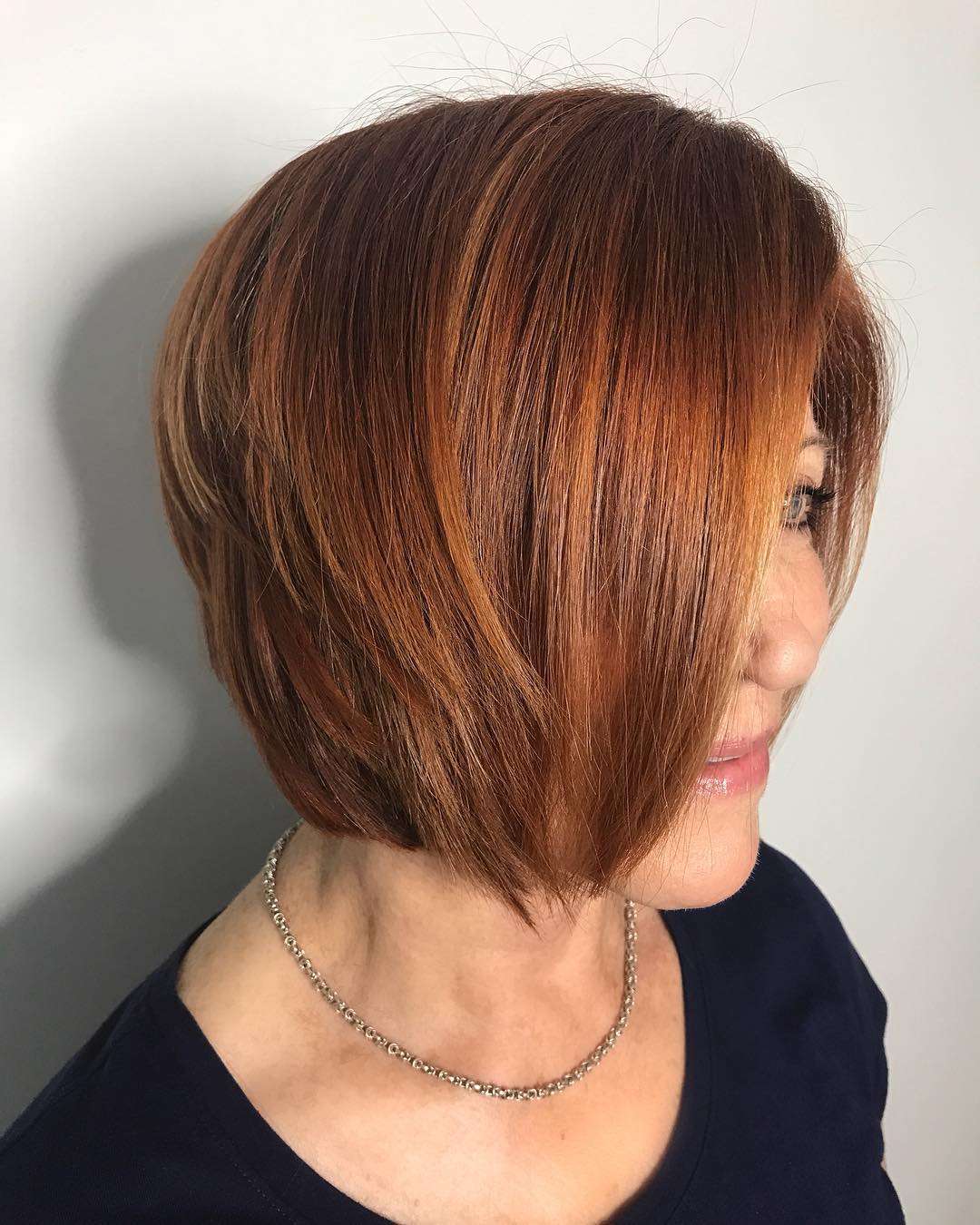 Warm Copper Angled Bob with Soft Layers
