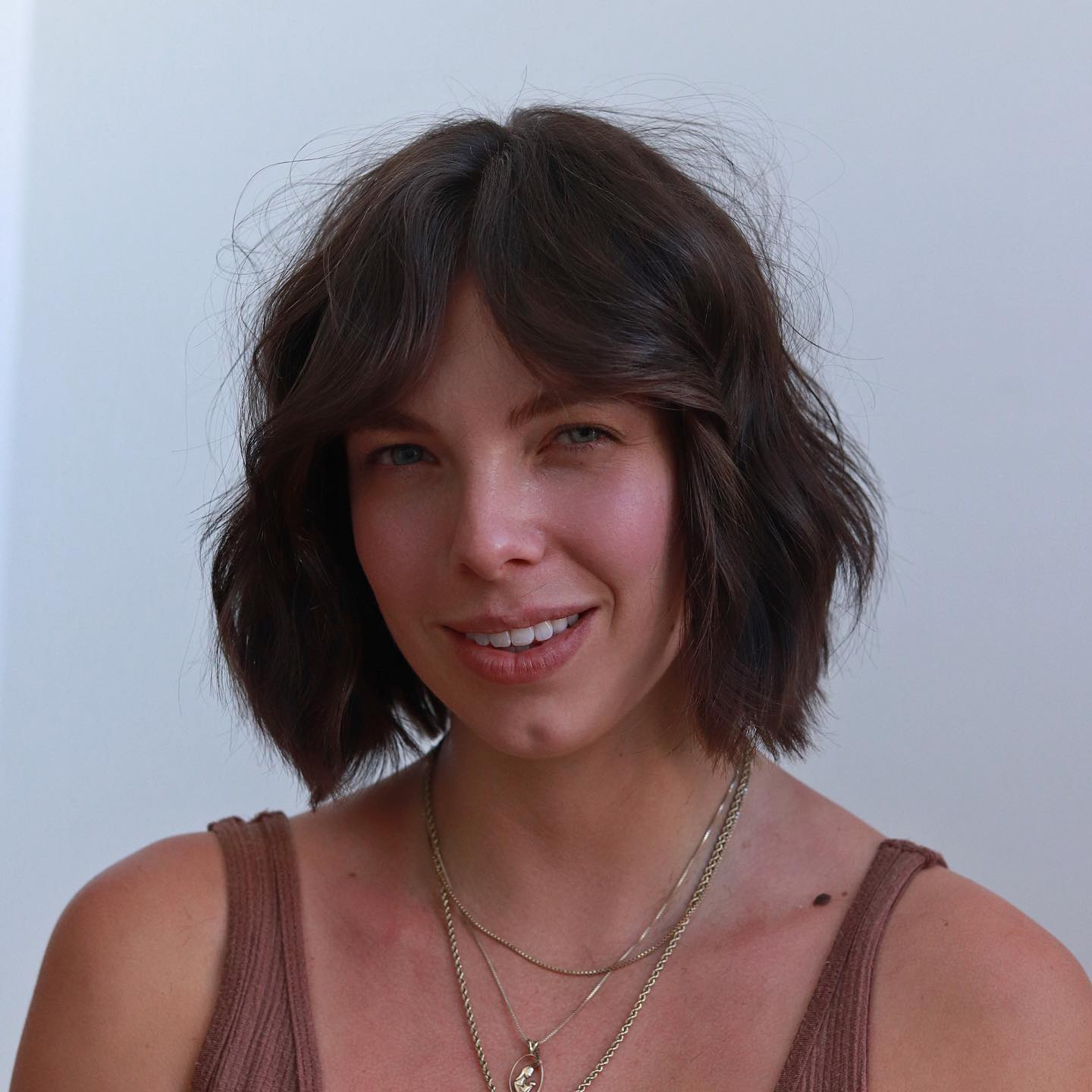 Effortlessly Chic Wavy Bob with Soft Bangs