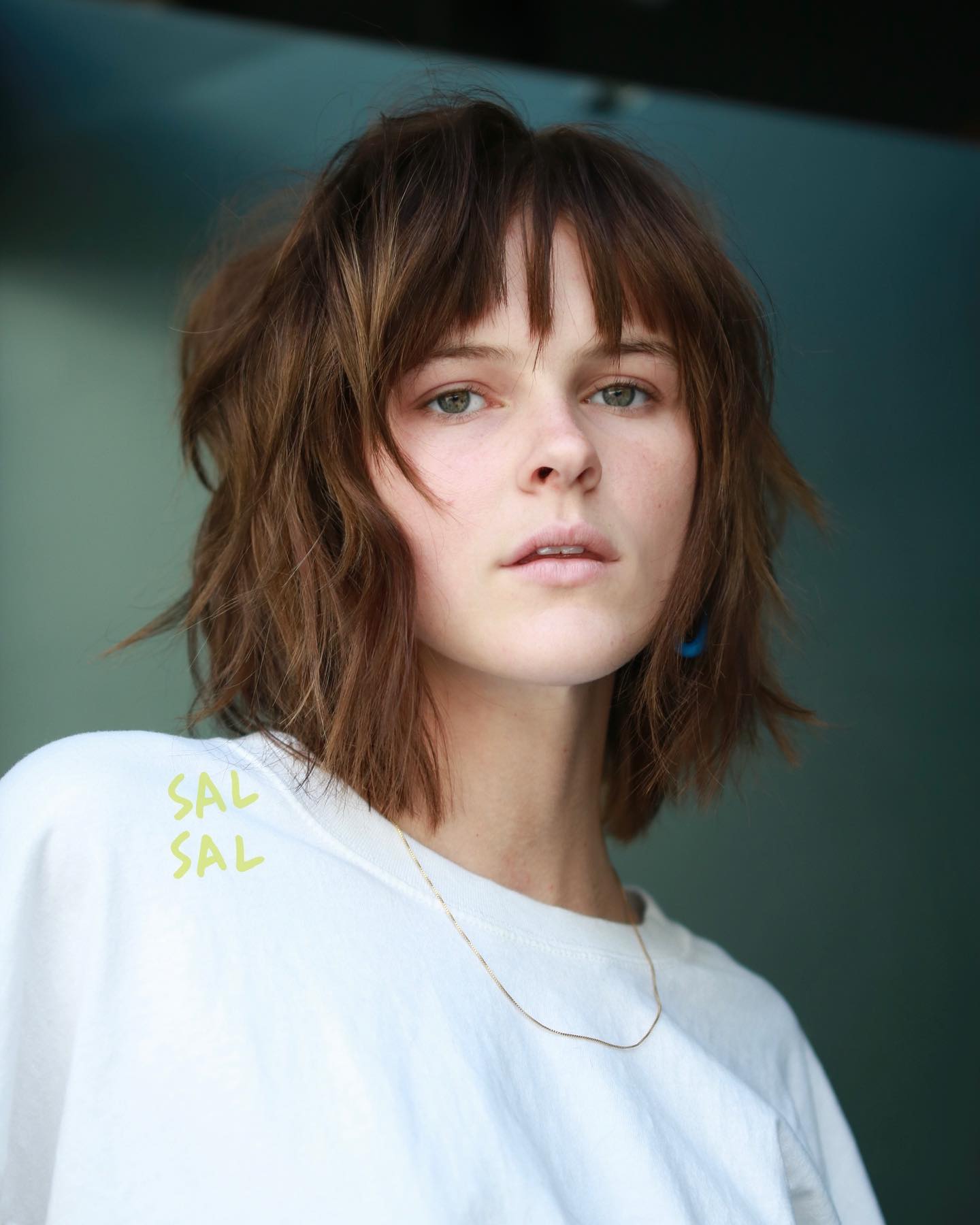 Effortlessly Styled Wavy Bob with Soft Bangs
