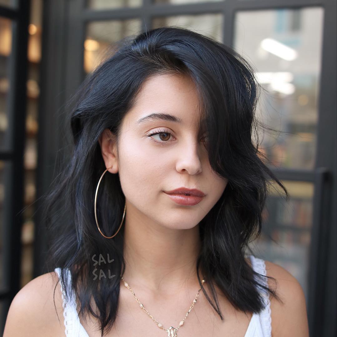 Effortlessly Styled Wavy Lob with Soft Bangs