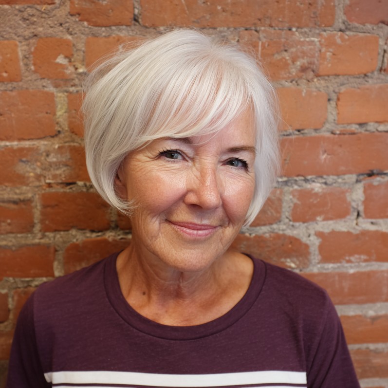 Softly Textured White Bob with Gentle Face-Framing Layers