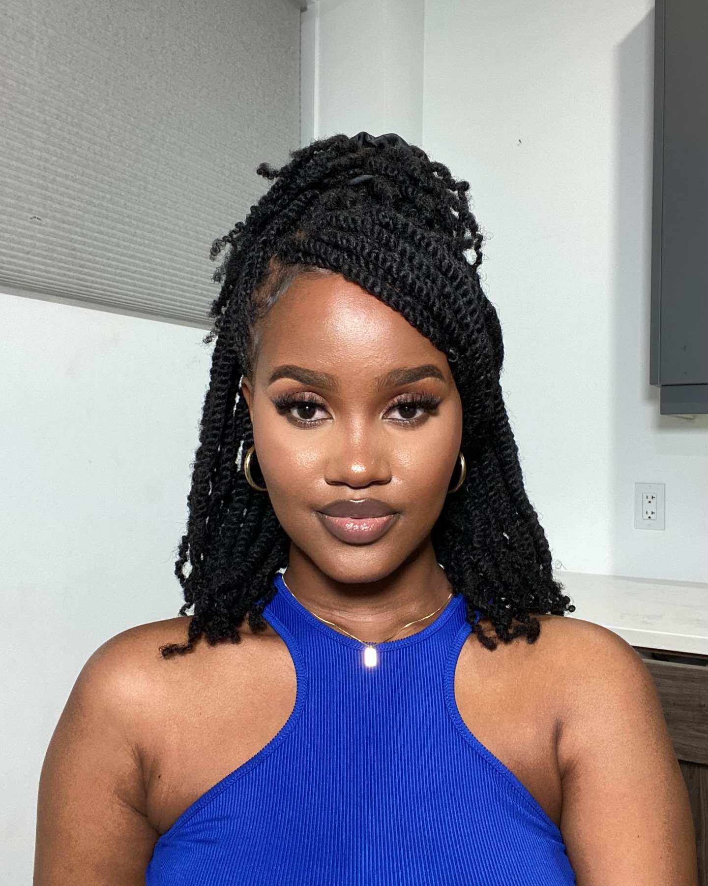 Chic Twisted Half-Up Style with Defined Ends
