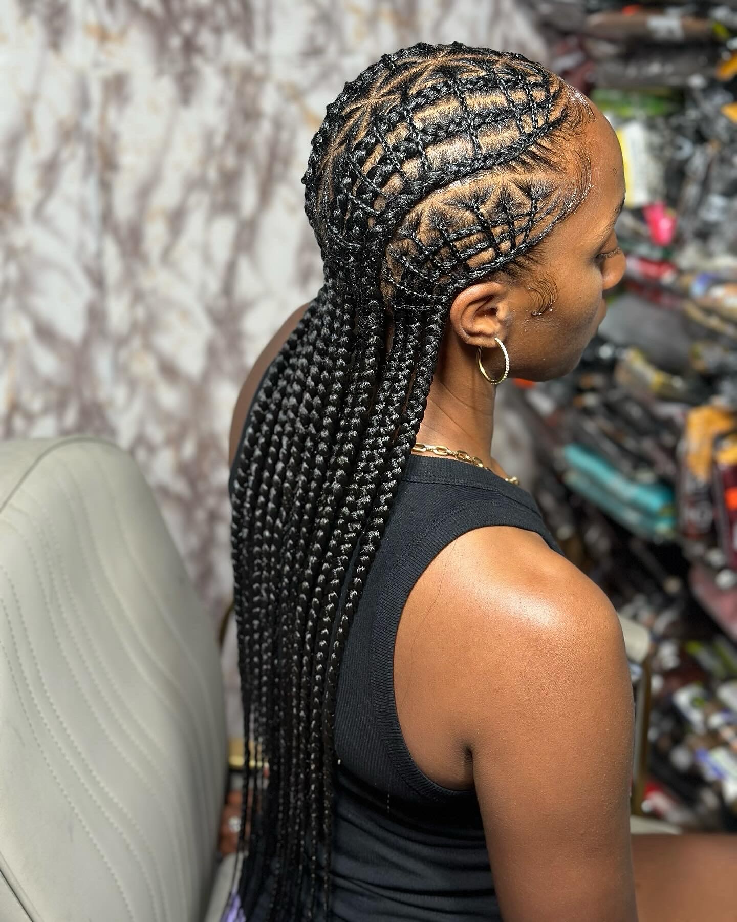 Intricate Cornrow Design with Long Box Braids
