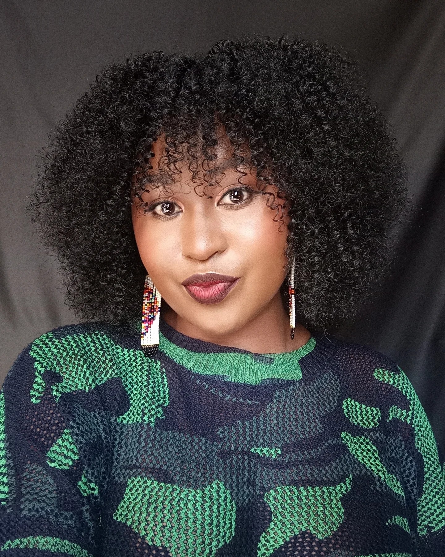 Voluminous Curly Afro with Defined Curls