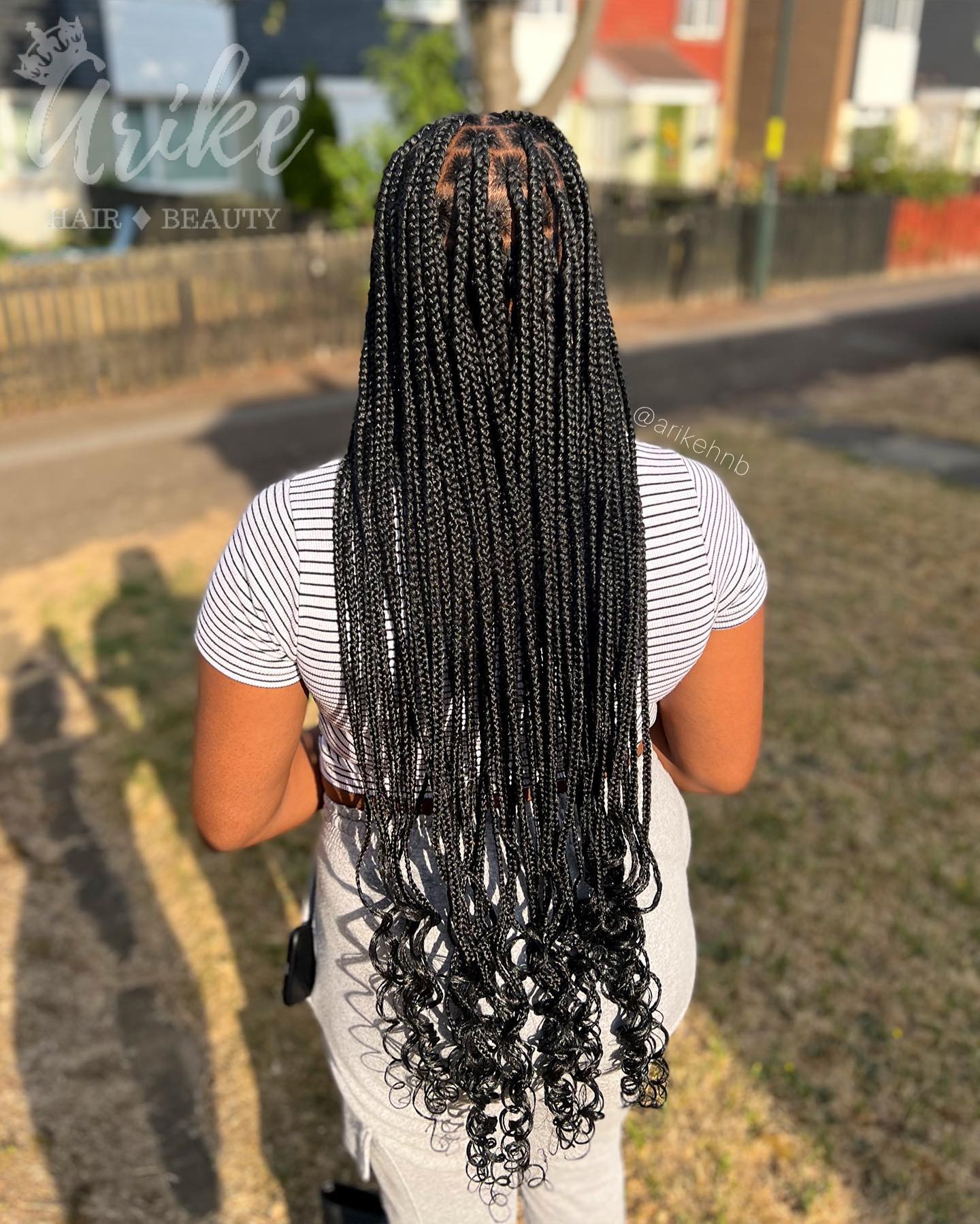 Chic Waist-Length Box Braids with Curly Ends