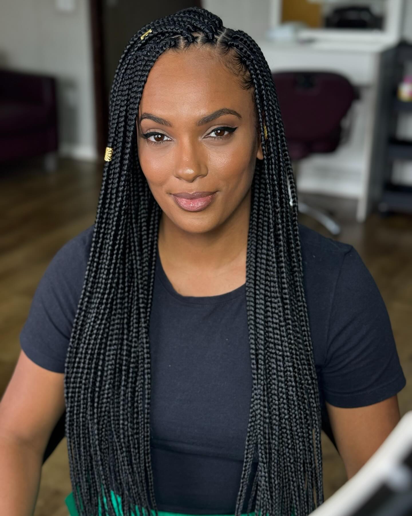Elegant Long Black Box Braids with Subtle Golden Accents