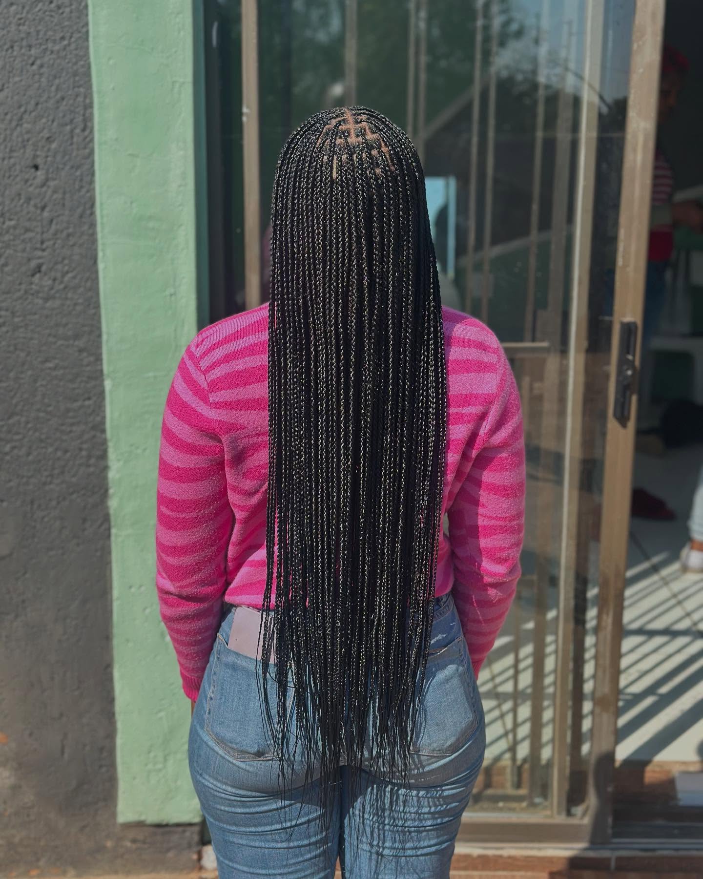 Glamorous Waist-Length Box Braids with Intricate Parting