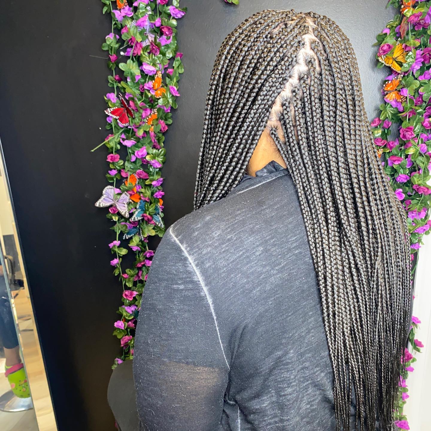 Long and Sleek Box Braids with a Side Part