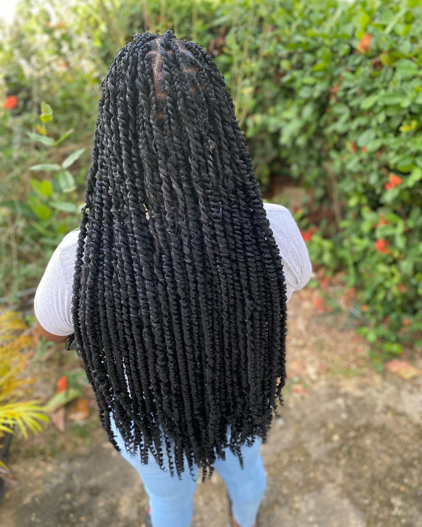 Luxurious Waist-Length Box Braids with Defined Twists