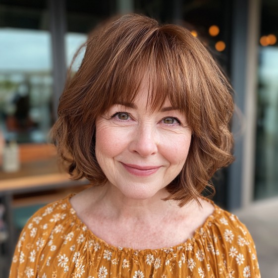 Warm Textured Bob with Soft Curtain Bangs