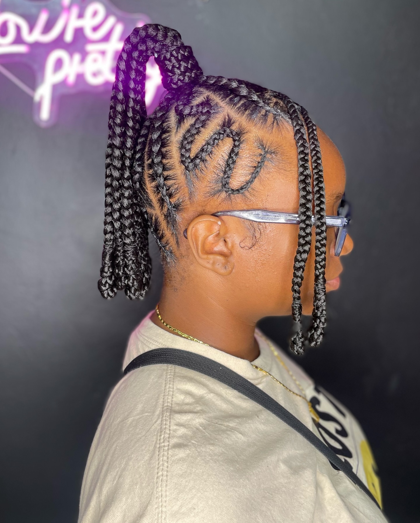 Chic High Ponytail with Intricate Feed-in Braids