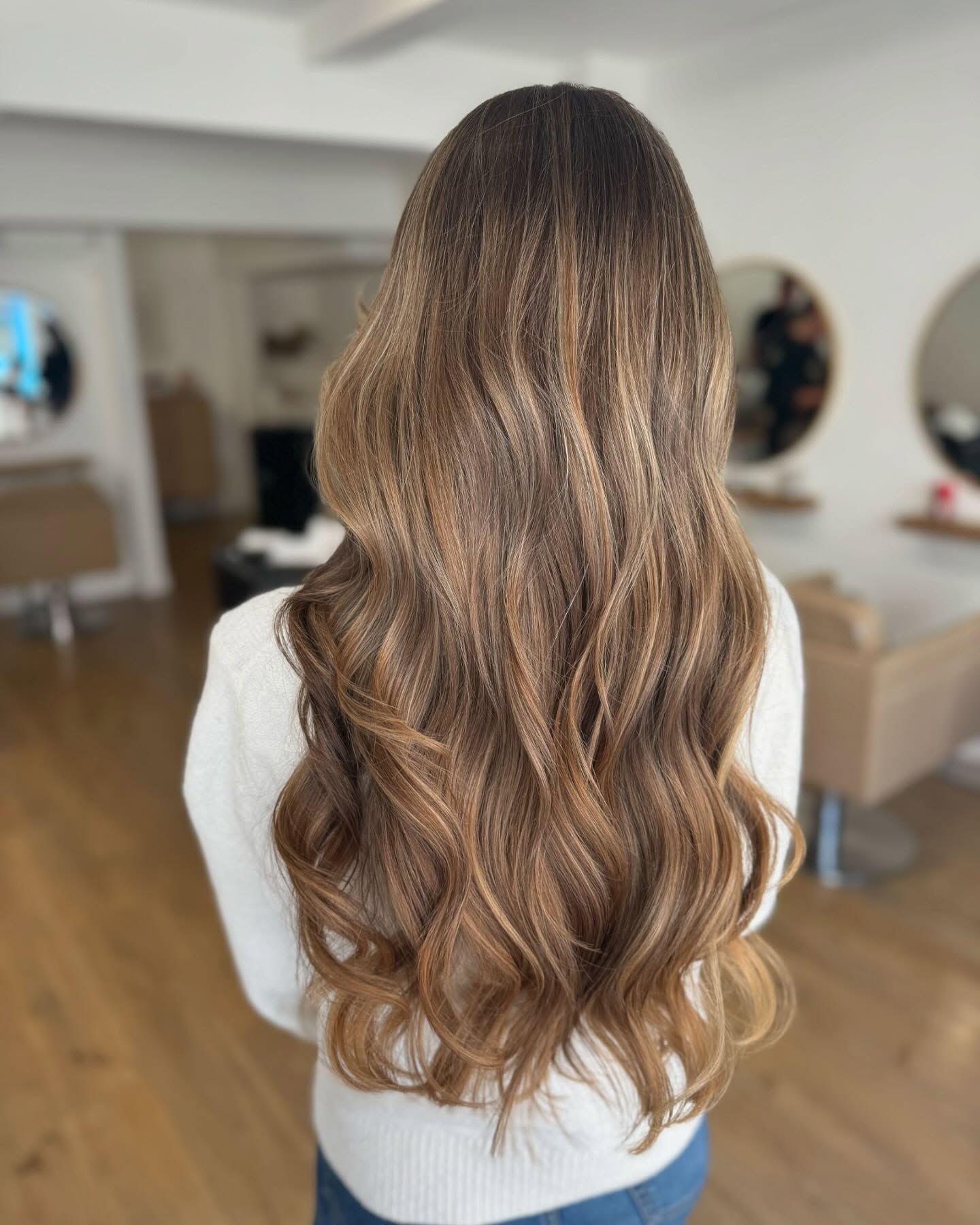 Beautiful Long Dark Blonde Waves with Subtle Highlights