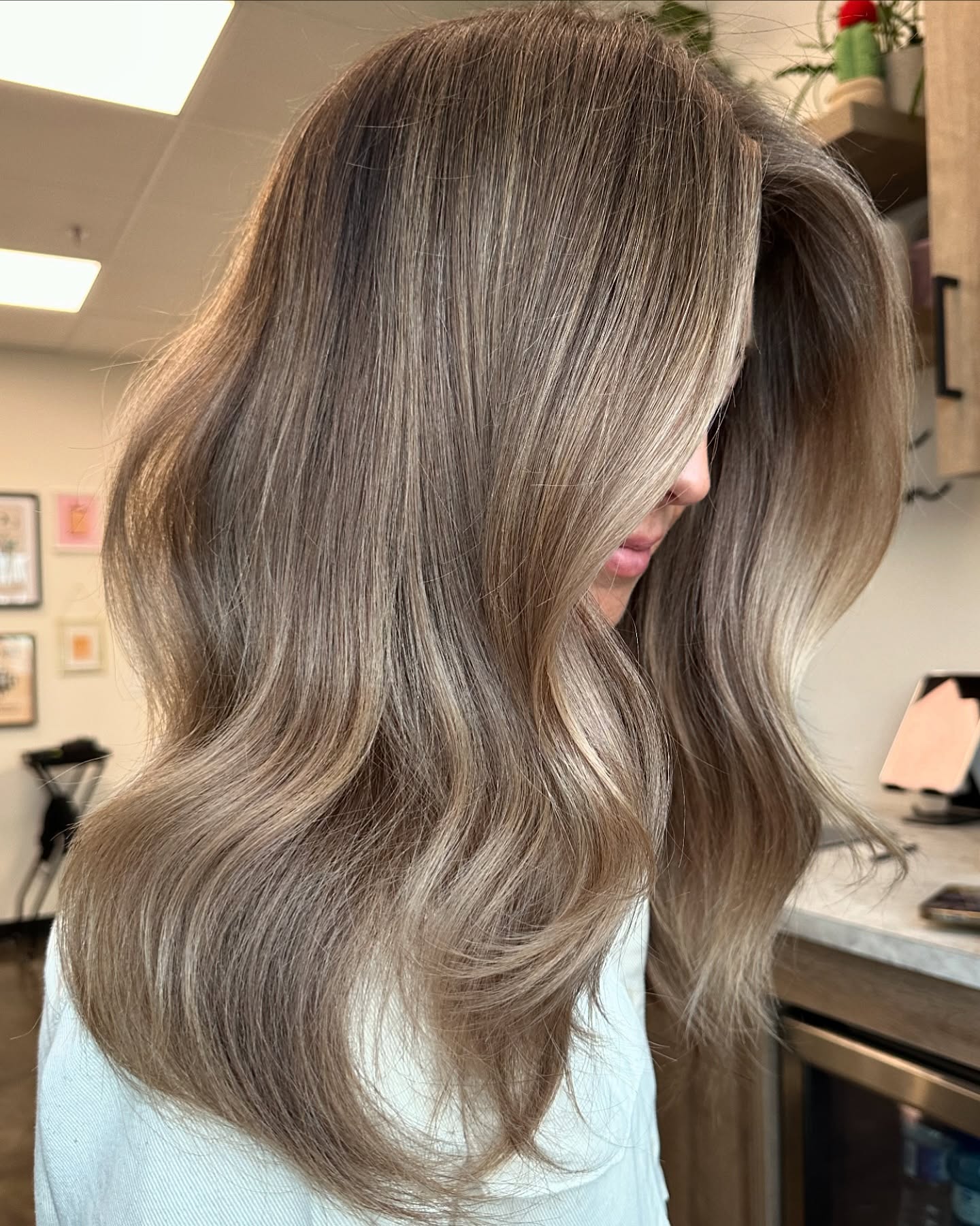 Chic Dark Blonde Balayage with Soft Waves