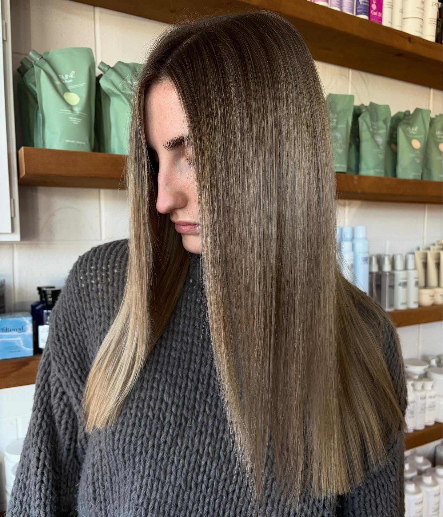 Glossy Dark Blonde Straight Cut with Subtle Dimension