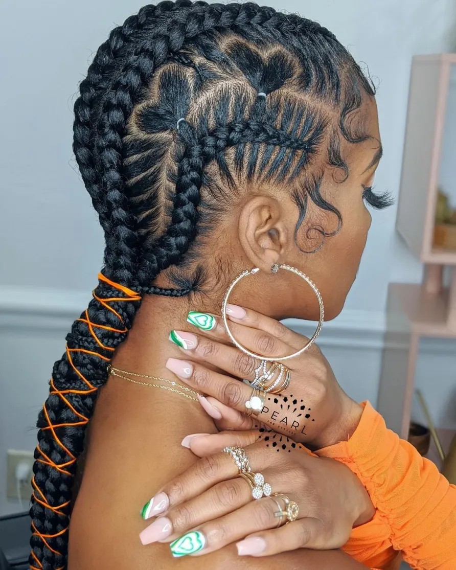 intricate feed in braids with colorful accents