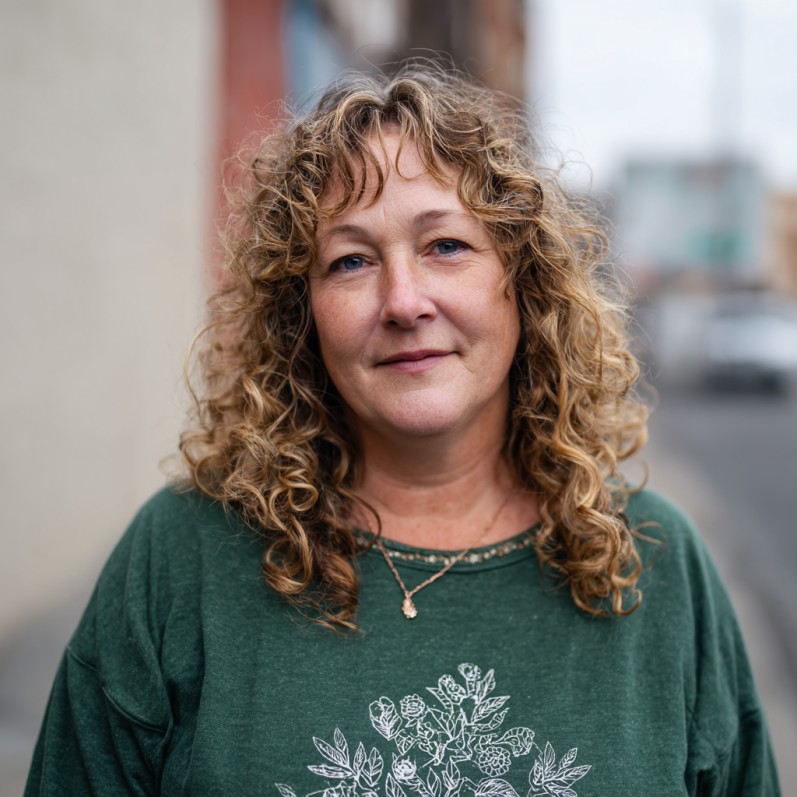 Textured Dark Blonde Curly Layers with Subtle Volume