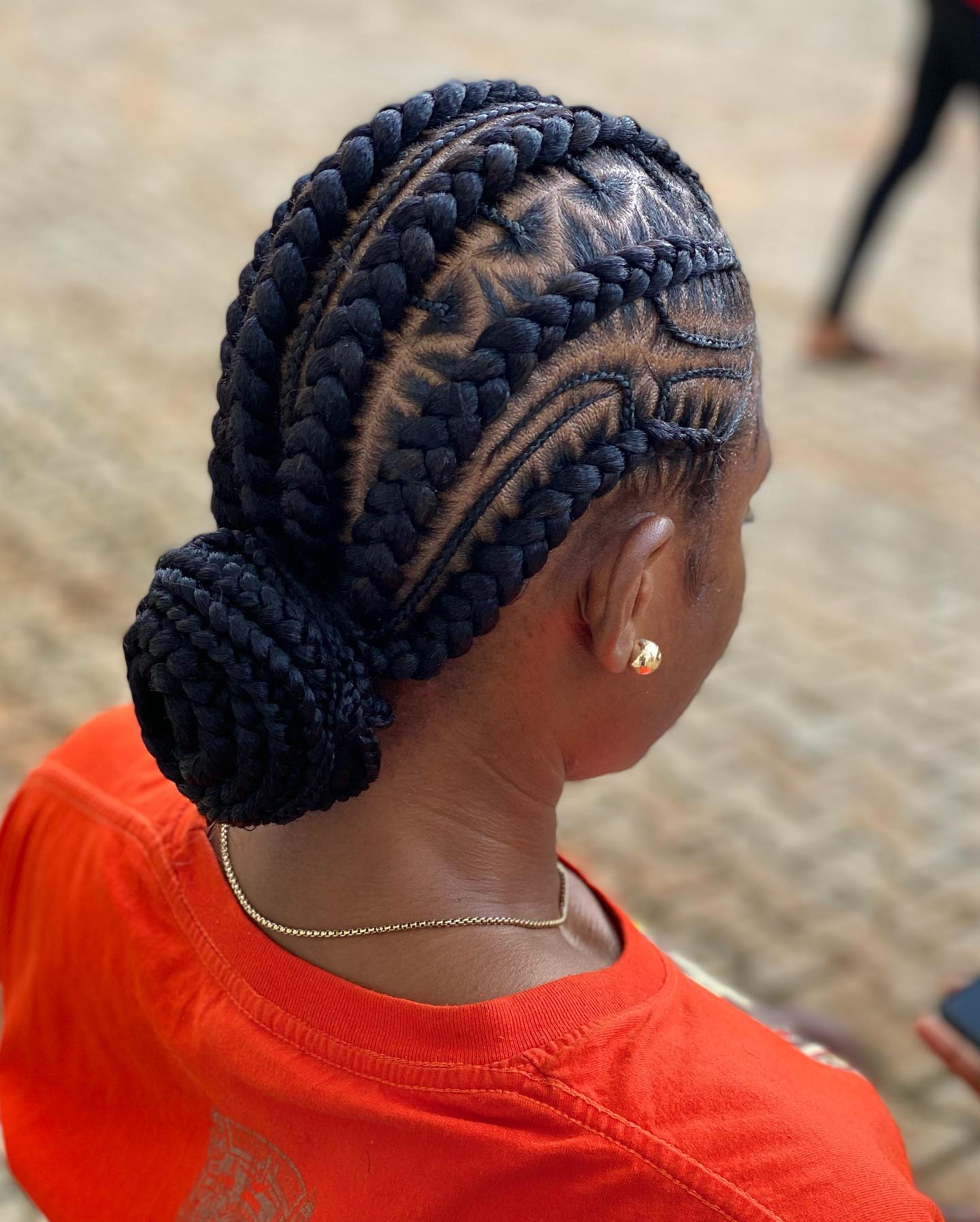 Elegant Intricate Stitch Braids with Low Bun