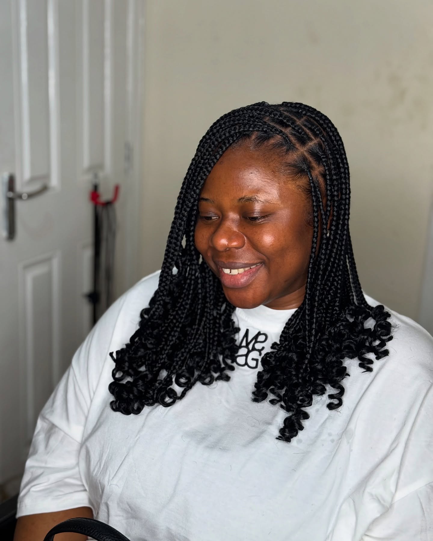 Playful Mid-Length Knotless Braids with Curly Tips