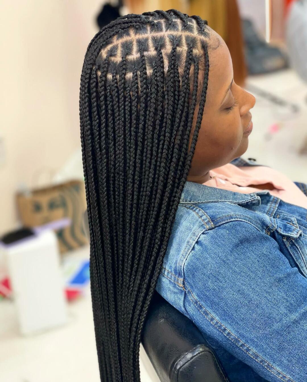 Sleek and Long Knotless Braids with Defined Parting