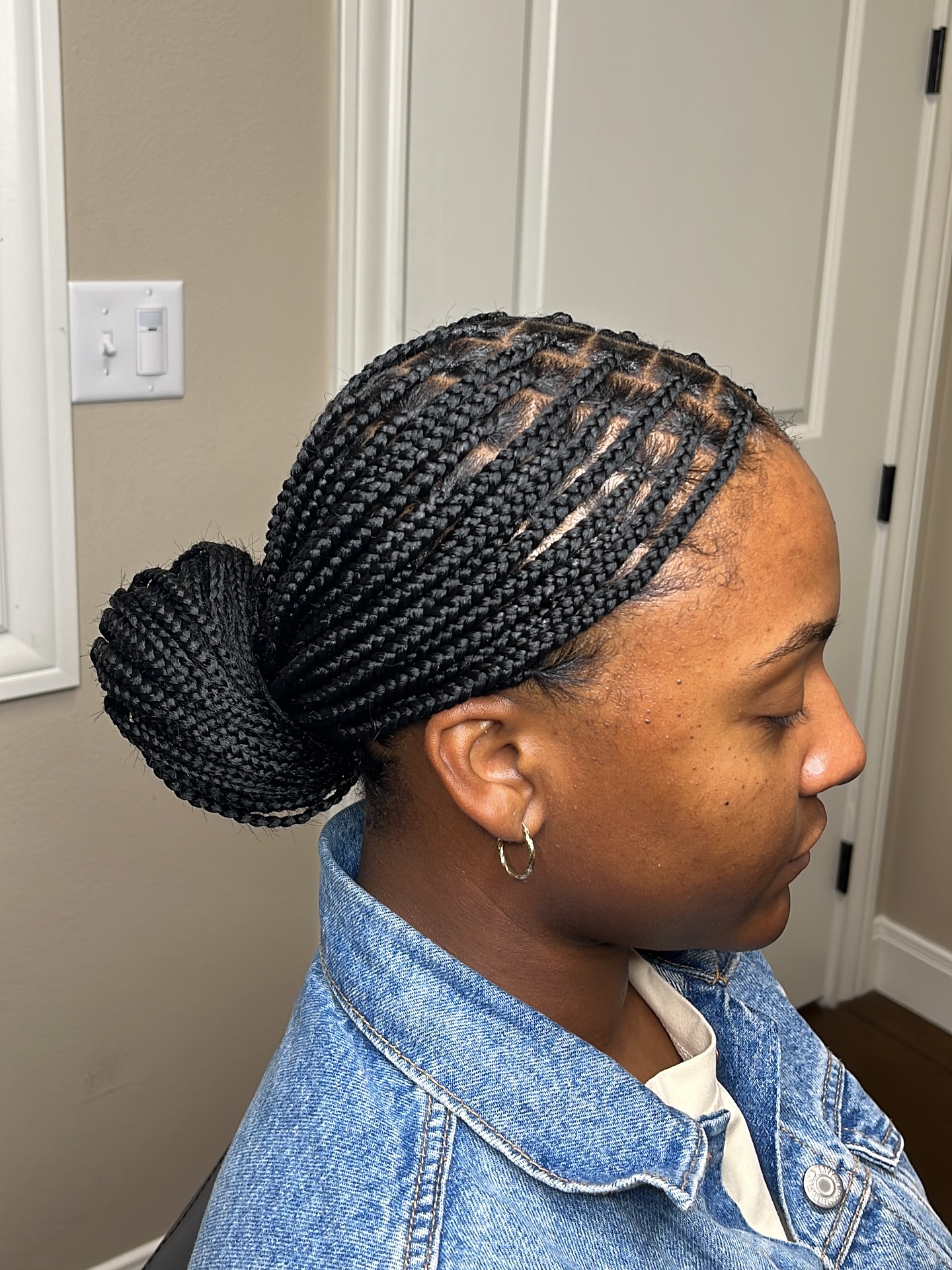 Sleek High Knotless Braids with Neat Bun