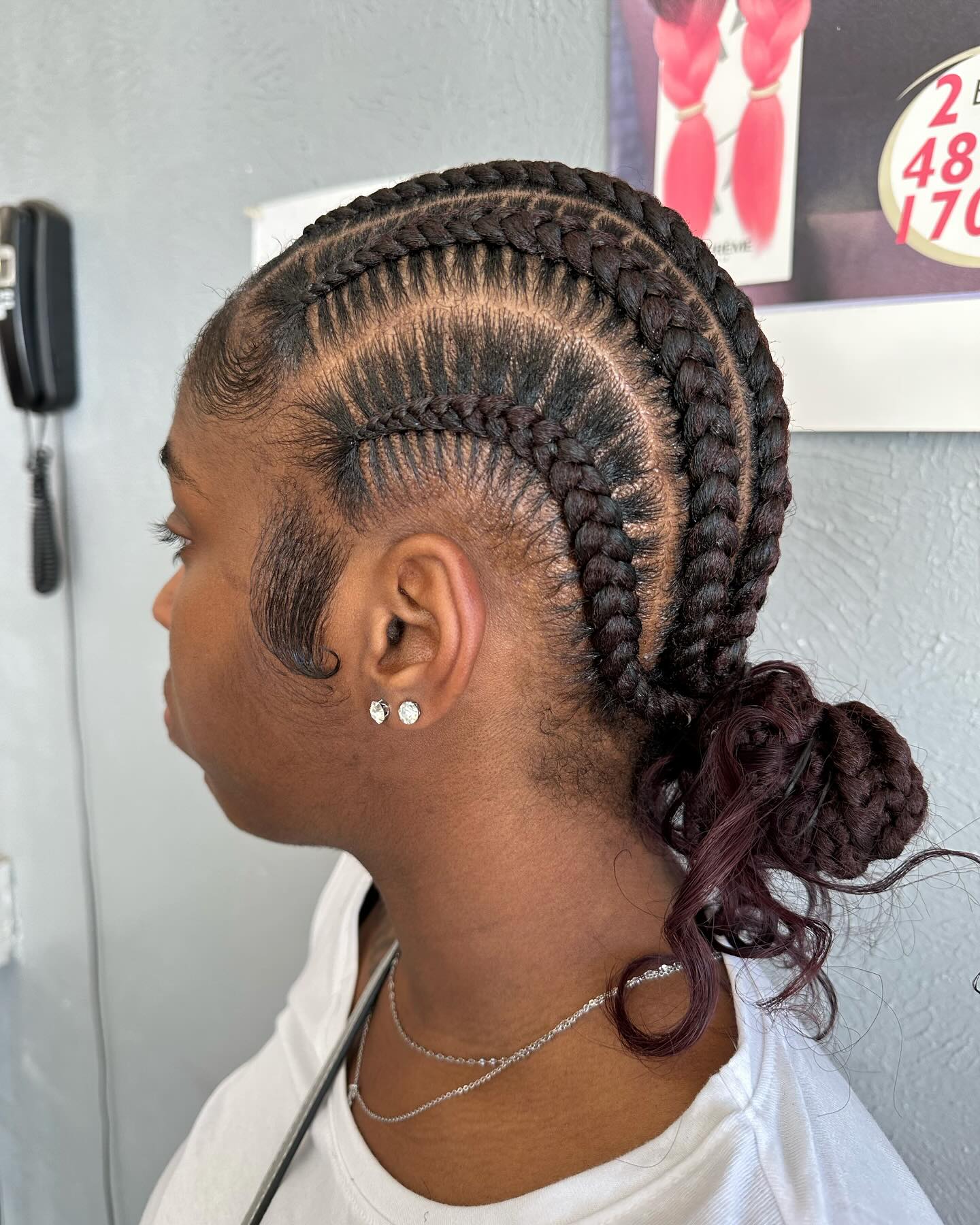 Stylish Asymmetrical Stitch Braids with Playful Curls