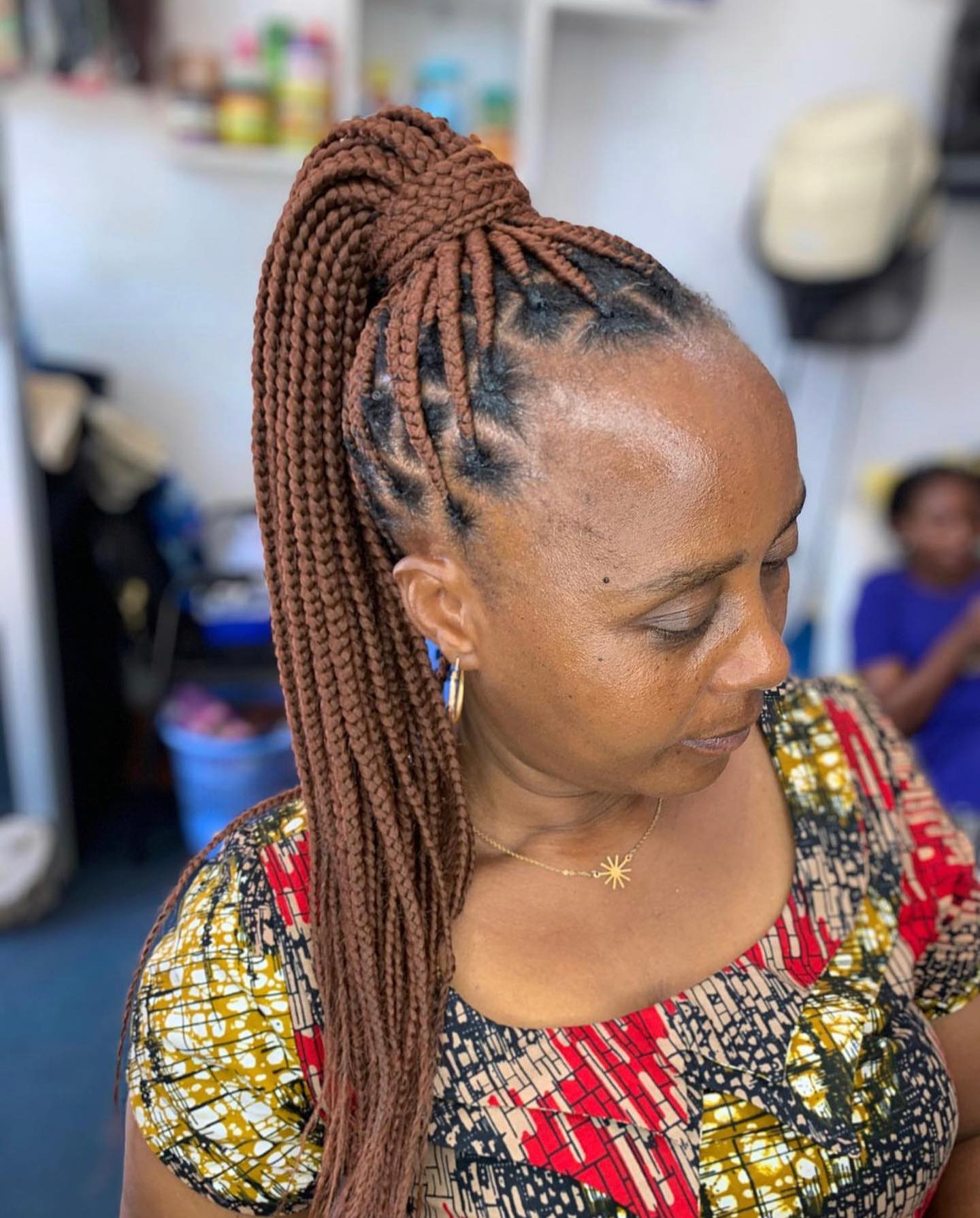 Stylish High Knotless Braids with Intricate Side Parting