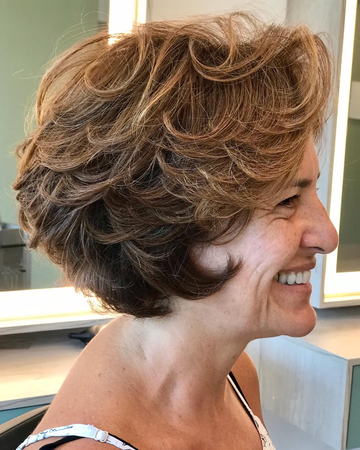 Textured Stacked Brunette Bob with Warm Highlights