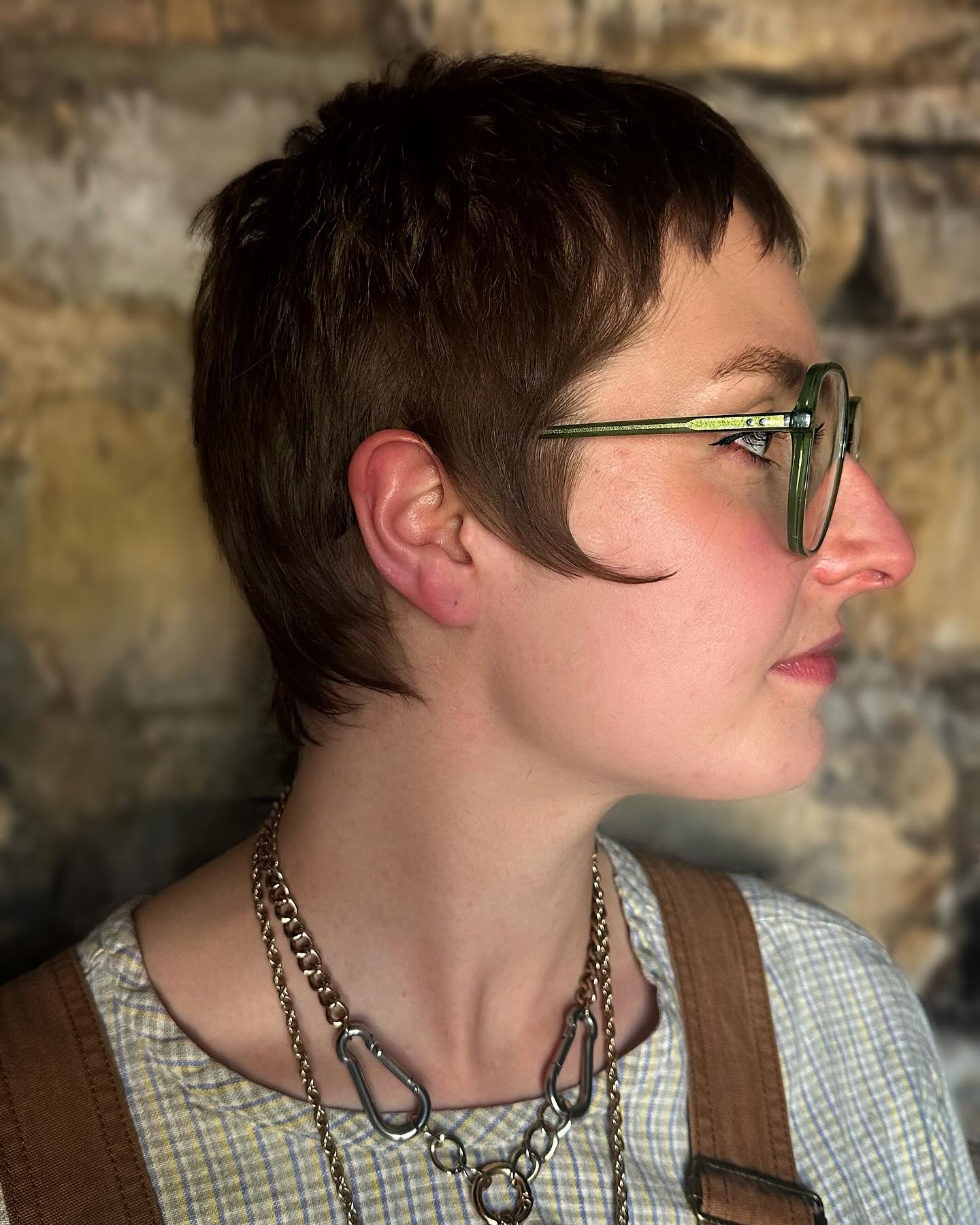 Edgy Wispy Pixie Cut with Playful Side-Swept Layers