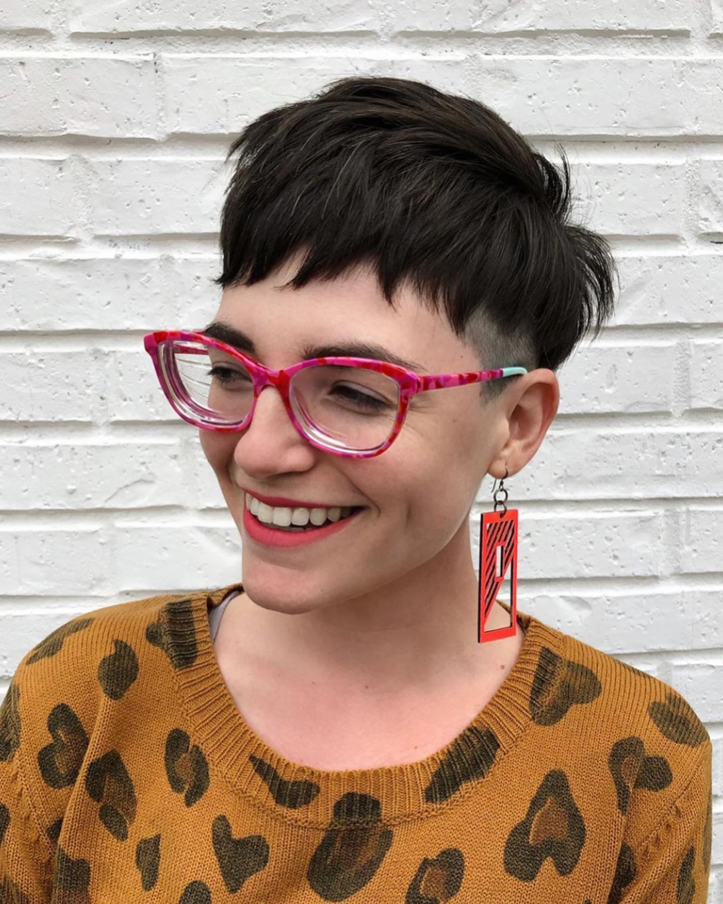 Modern Wispy Pixie Cut with Undercut Details