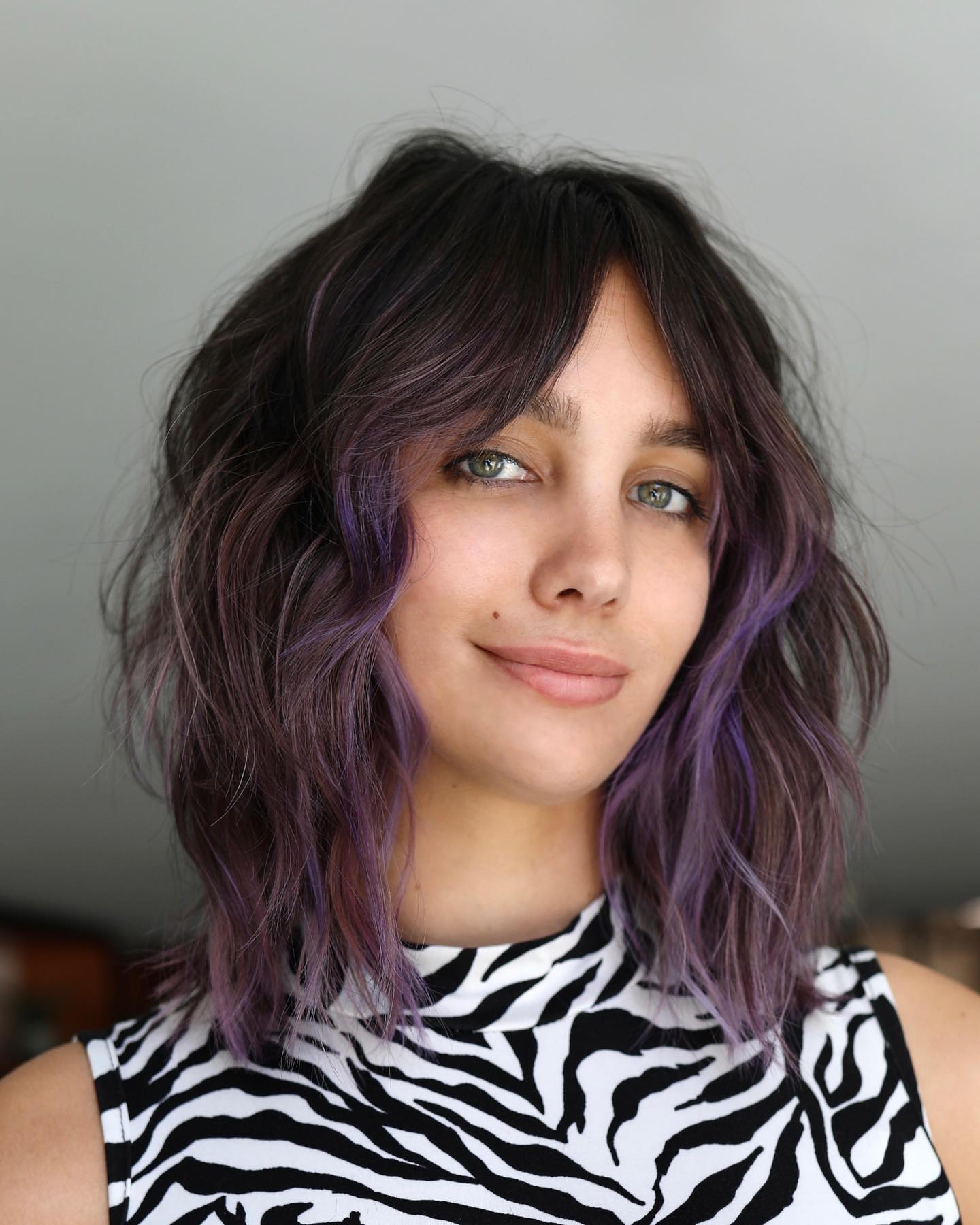 Chic Undone Layered Bob with Lavender Highlights