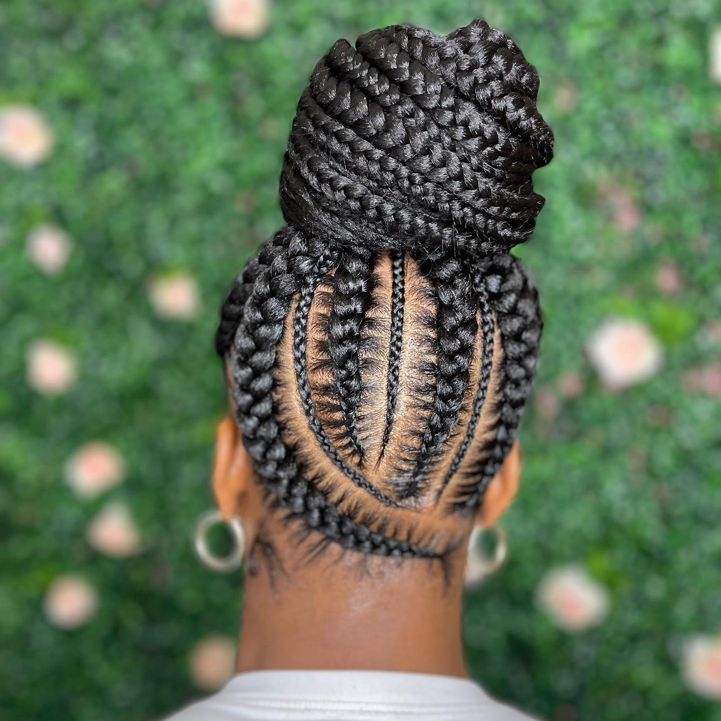 Elegant High Bun with Intricate Stitch Braids