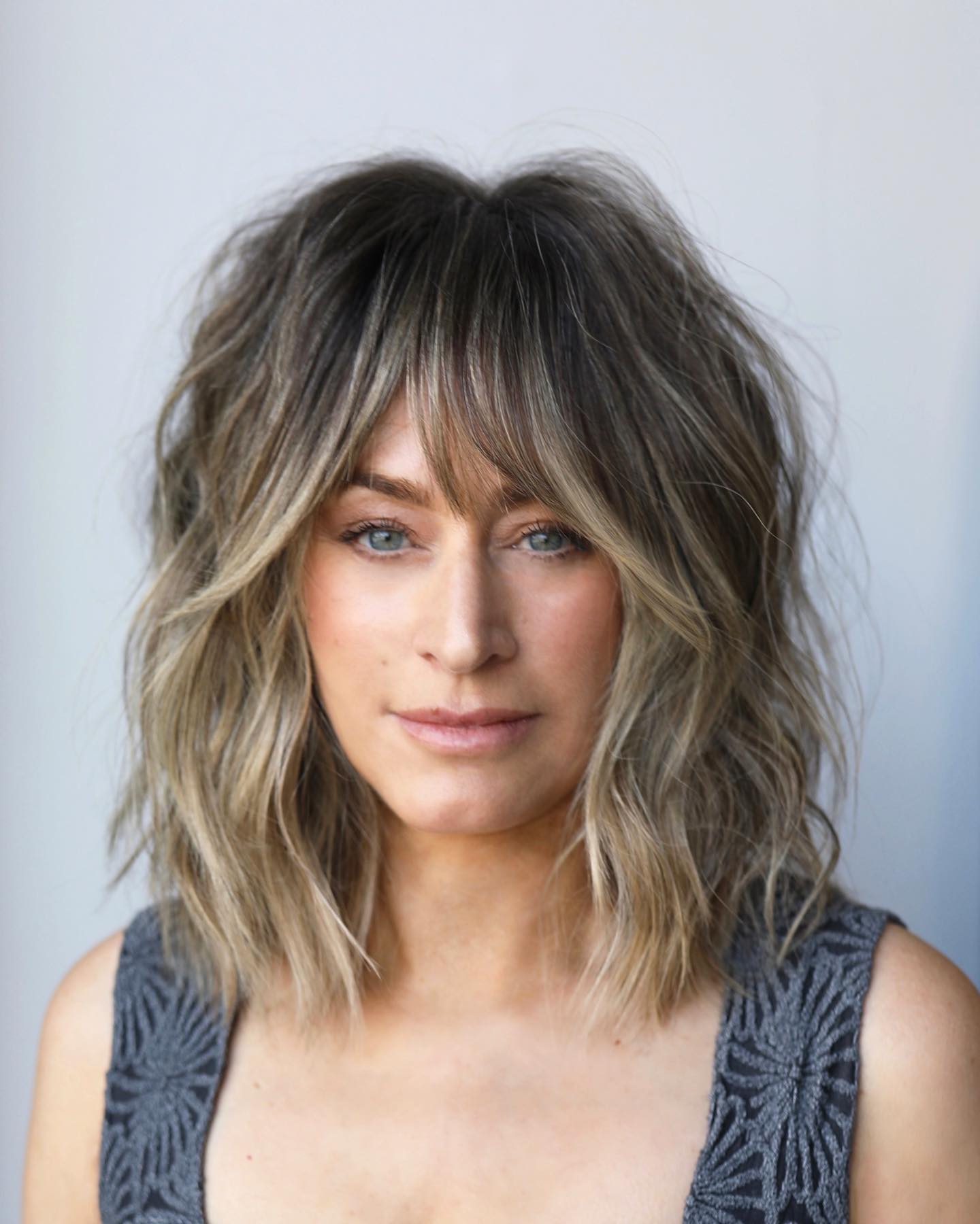 Textured Layered Bob with Face-Framing Bangs