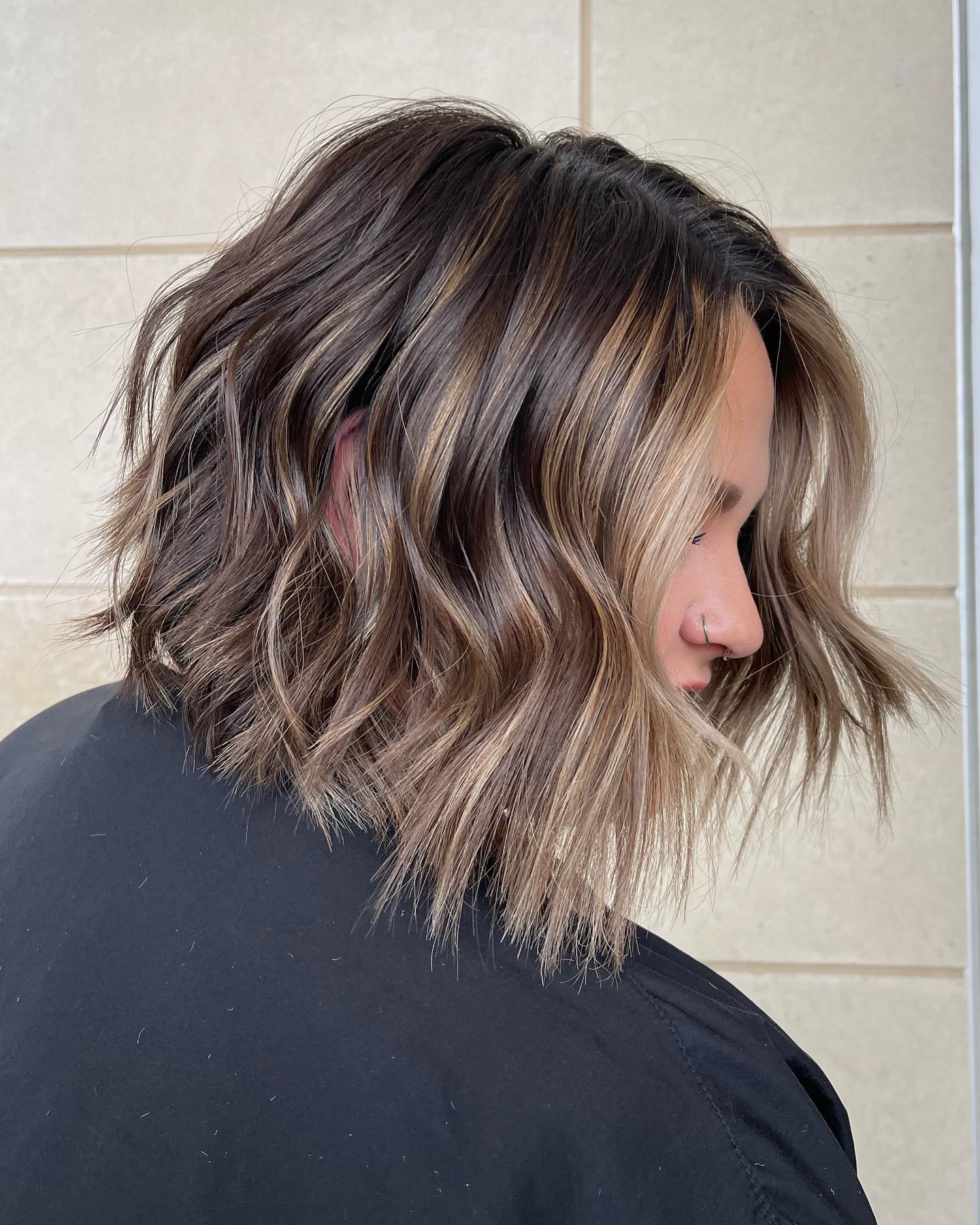 Textured Wavy Balayage Bob with Caramel Highlights
