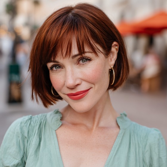 Textured Copper Pageboy Bob with Subtle Side Bangs