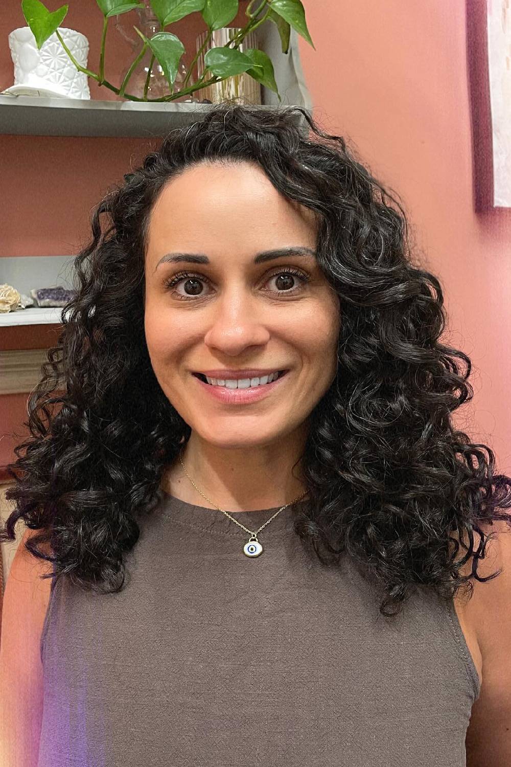 Defined Curly Cut with Soft Face-Framing Layers