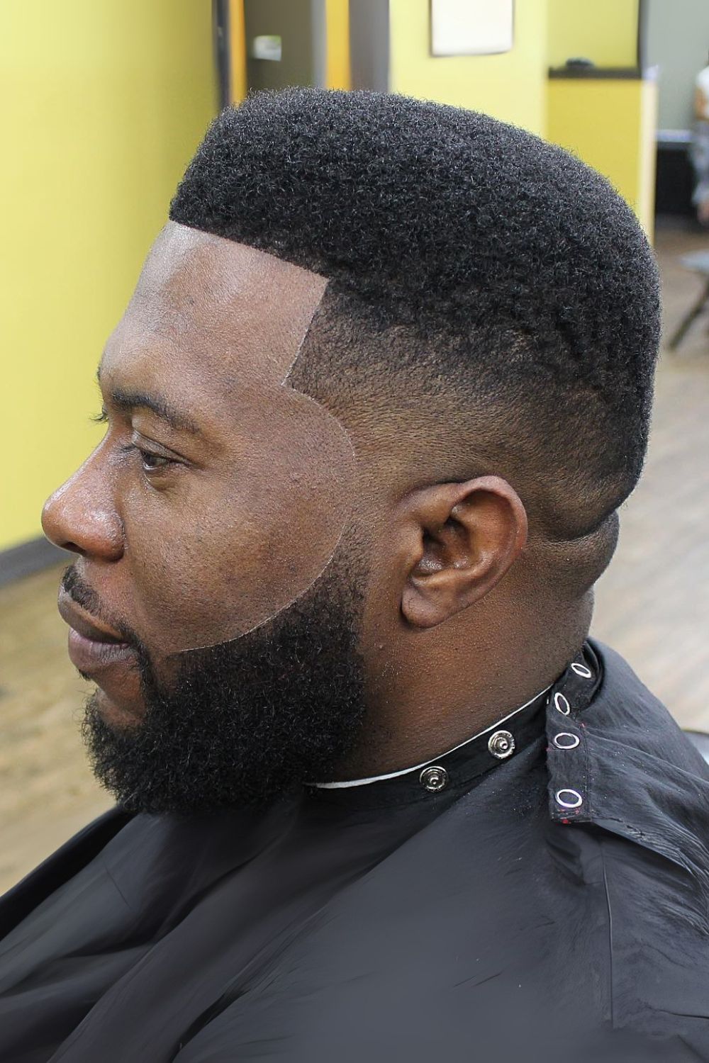 Defined High-Top Fade with Intricate Line Work