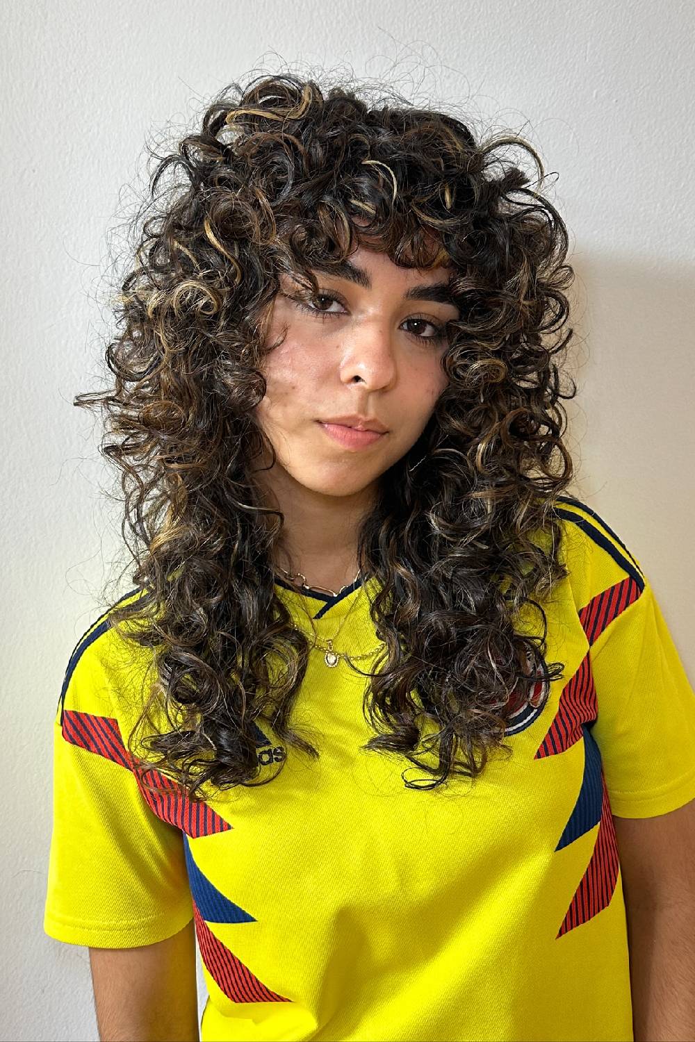 Dynamic Curly Shag with Textured Bangs