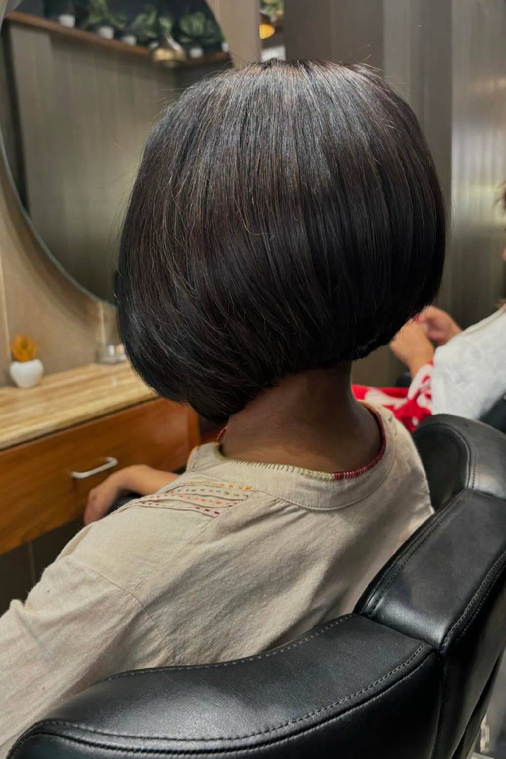 Glossy Rounded Bob with Subtle Understated Layers