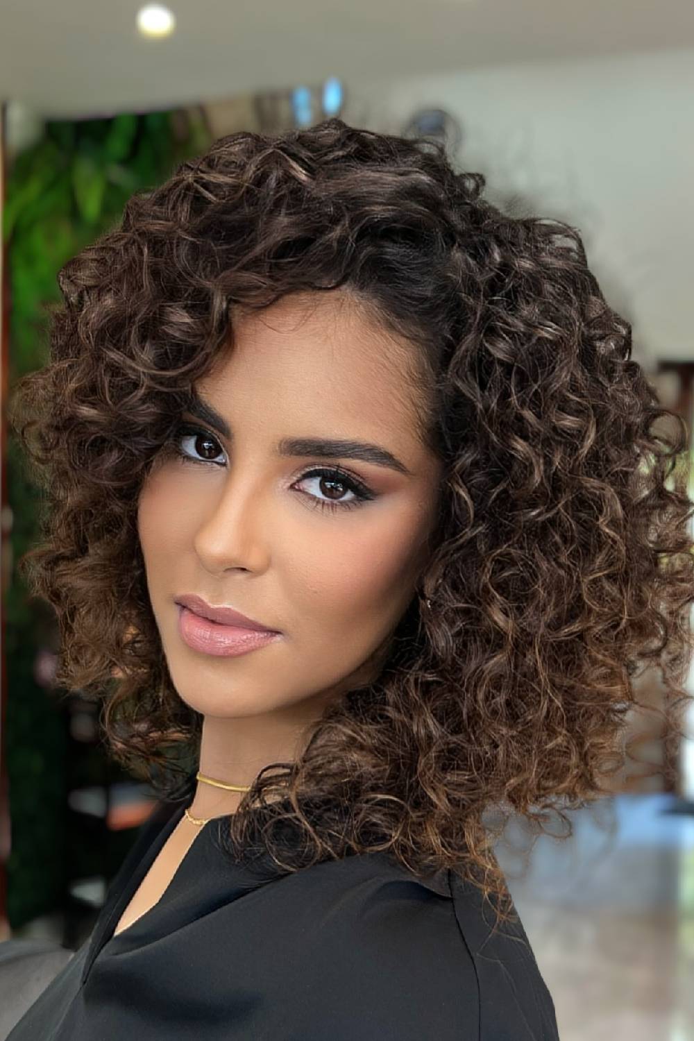 Modern Curly Lob with Subtle Highlights