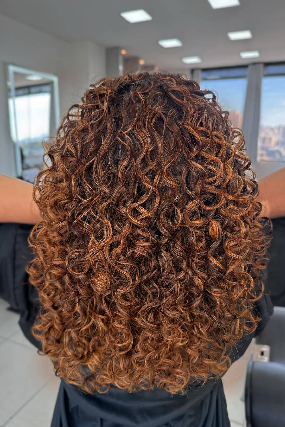 Rich Chestnut Curly Mane with Defined Ringlets