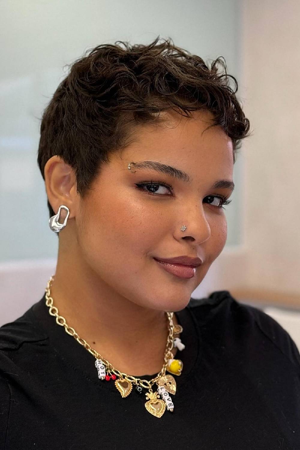 Stylish Short Curly Pixie Cut with Defined Texture