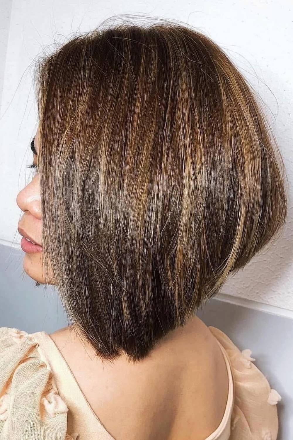 Textured Brunette Bob with Sun-Kissed Highlights