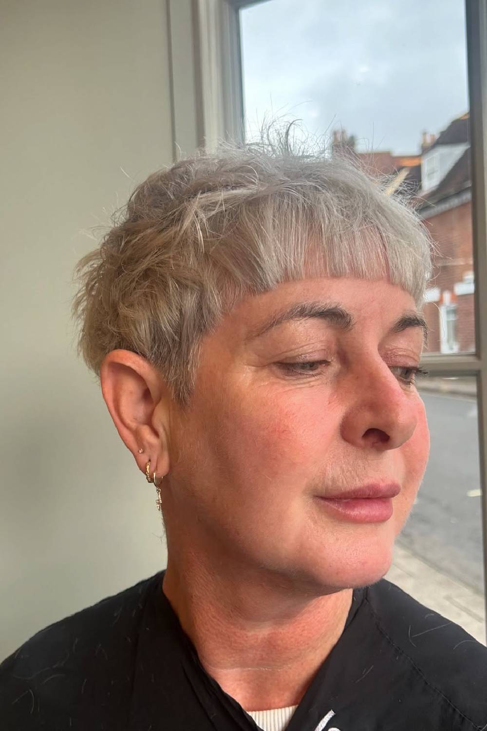 Textured Pixie Cut with Soft Bangs and Natural Waves